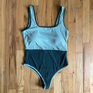 Kittenish one piece swimsuit in size large.